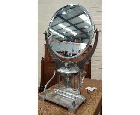 A modern Secessionist style dressing table mirror in circular silvered frame, height 80cm 