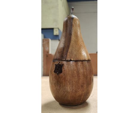 A carved fruitwood tea caddy in the form of a pear 