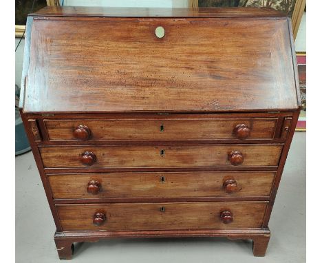 Georgian mahogany 4 front bureau with 4 drawers below, fitted interior on bracket feet.&nbsp;Dimensions:- 97 x 52 x 107cm hig