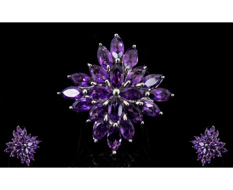 Large Uruguayan Amethyst Starburst Statement Ring, 18cts of marquise cut, rich purple, amethysts set in a starburst fashion, 