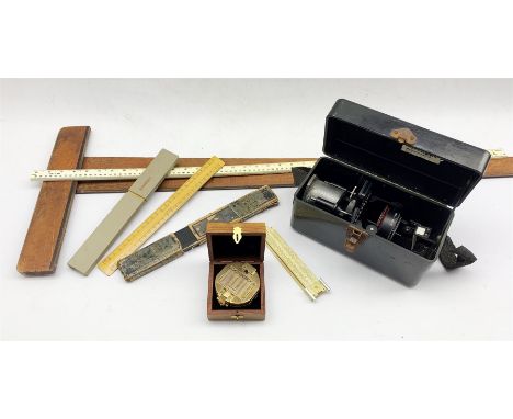 Astro Compass Mk II by Boes Co. Ohio, modern brass Stanley compass, two slide rules, T square etc  