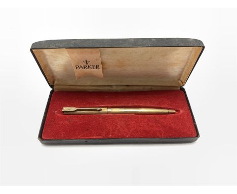 9ct gold cased Parker ballpoint pen, hallmarked for London 1974, with engine turned decoration and vacant rectangular plaque,