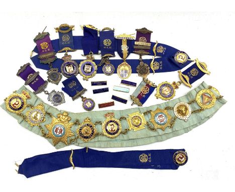 Four RAOB silver gilt and enamel breast jewels 1907-33, silk and velvet aprons, cuffs, various base metal jewels, sash etc 