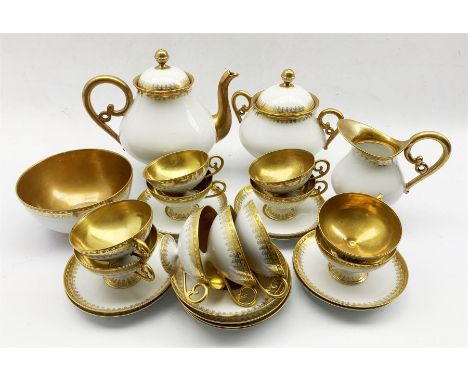 Venezia tea set by Rigo &amp; Co decorated in gilt comprising eleven cups, twelve saucers, tea pot, milk jug, slop bowl and s