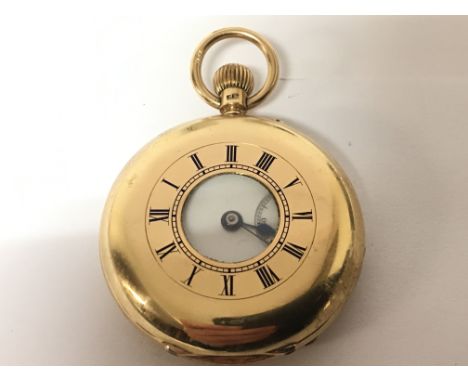 A Quality 18carat gold half Hunter pocket watch button wind seen working. Maker Russellâ€™s Limited Liverpool with an inner g