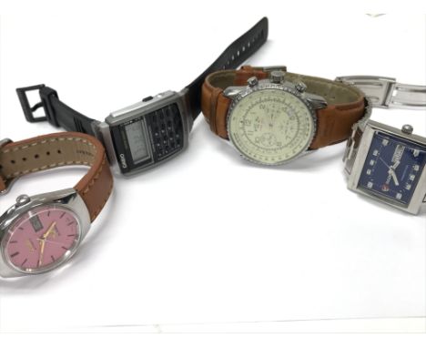 A vintage Rado automatic watch, The Manhattan. Also a Casio calculator Watch, a citizen automatic watch and a Rotary chronic 