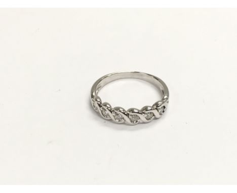A white gold diamond set ring, tested as high carat, approx 3.6g and approx size R.