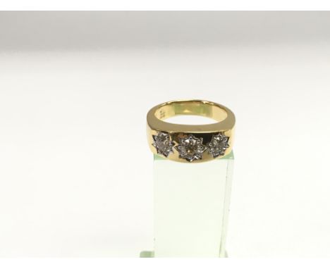 A 9ct gold three stone gypsy style diamond ring , RBC diamonds approx 1.04ct (centre stone approx 0.41ct, outers approx 0.63c