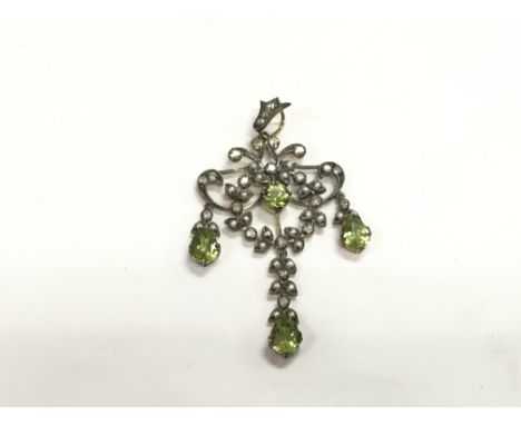 A boxed Edwardian style peridot, seed pearl and diamond chandelier pendant, peridots approx 2.70ct.