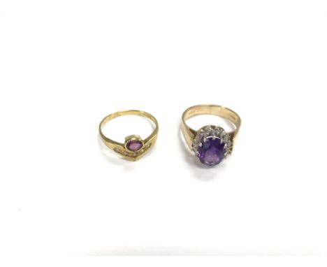 Two gold rings comprising a 9ct gold, diamond and amethyst cluster ring plus an 18ct gold, diamond and amethyst wishbone ring