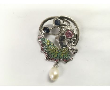 A silver plique a jour brooch/pendant in the form of a lady's head in profile and set with a suspended pearl, sapphires and a