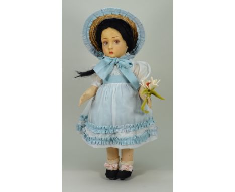 A Lenci felt cloth doll, Italian circa 1930s, the moulded felt head with nicely painted features, brown side glancing eyes an