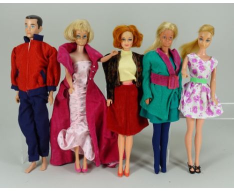 Collection of vintage Mattel dolls, 1960s/70s, Ken with moulded hair, Barbie with short blonde hair and straight legs wearing