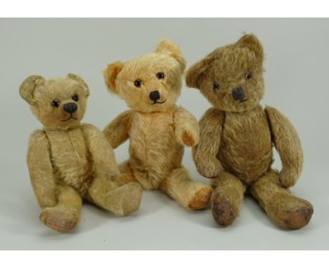 Three English mohair Teddy Bears, 1930s, including a Deans golden mohair bear with orange glass eyes, stitched nose and mouth