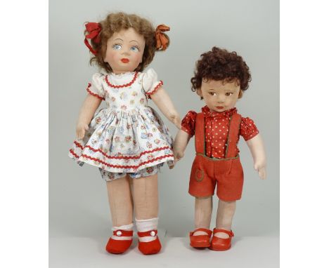 Two Chad Valley cloth dolls, English circa 1930, the boy and girl both with painted features brown wigs, swivel heads girl we