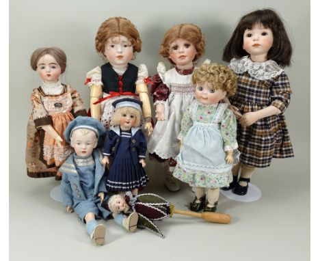 Collection of eight modern reproduction and artist dolls, including a 1988 A.Marque in autumnal floral patterned dress, 16” (