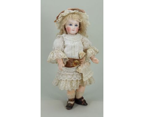 Rare and interesting early bisque head mystery Bebe doll for ‘AU NAIN BLEU’ of Paris, French circa 1880, beautiful pale bisqu