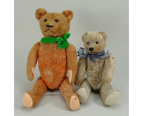 Two 1920s English mohair Teddy bears, apricot straw stuffed mohair bear with weighted growler (inoperative), red glass eyes, 