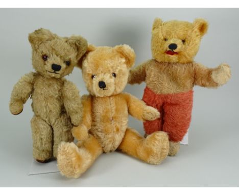 Three British mohair Teddy Bears, 1950s, including an Alpha Farnell bright golden mohair bear with orange glass eyes, stitche