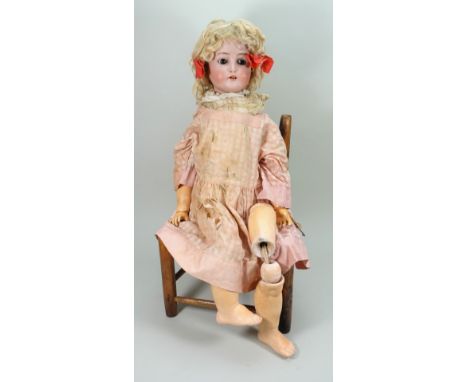 Simon &amp; Halbig/K&amp;R bisque head doll, German circa 1905, with weighted brown glass eyes, painted features, open mouth 