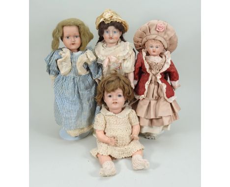 Four bisque head dolls, English 1915-20, including a B shoulder head doll with painted features, brown wig, cloth body and bi