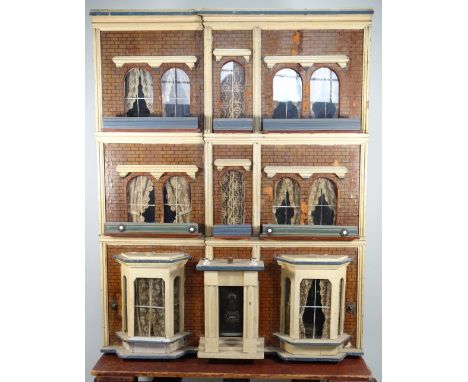 A large and impressive Silber and Fleming Dolls House, German circa 1880, the painted wood dolls house with paper brick effec