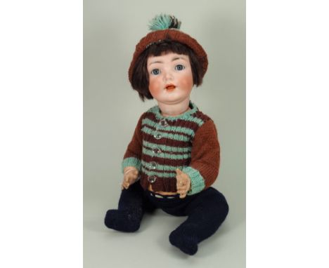 Simon &amp; Halbig/K&amp;R bisque head baby doll,  German circa 1915, with weighted blue glass eyes, open mouth with tongue a