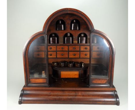 A good wooden model Shop room set, English early to mid-19th century, the shop with arched top and semi-rounded sides, open f