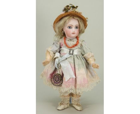 A good and early Almond eyed Portrait Jumeau bisque head Bebe doll, French circa 1880, the extremely pale bisque head with sp