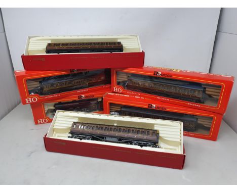 A boxed Rivarossi HO 'Royal Scot' Locomotive, five boxed LMS Coaches and a boxed Fleischmann HO Turntable 