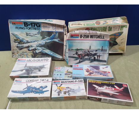 Nine plastic aircraft Kits to include a Monogram B-17G Flying Fortress (contents not in sealed bag but appears generally comp