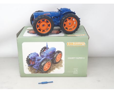A boxed Universal Hobbies County Super 4 Tractor 