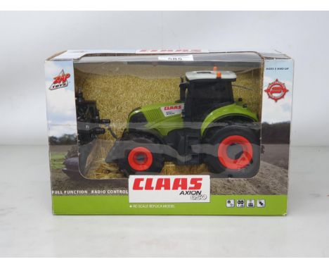 A boxed Radio Control Claas Axion 850 Tractor 