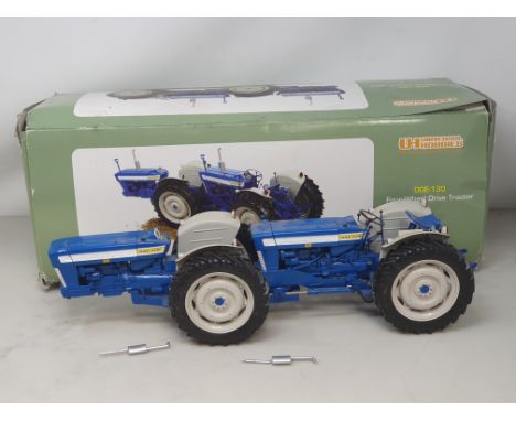 A boxed Universal Hobbies DOE-130 Tractor 