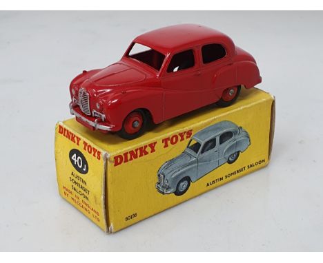 A boxed Dinky Toys No.40J red Austin Somerset Saloon 