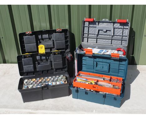 Four Tool Boxes containing a collection of Modelling Tools, Paints, Track Pins, and other Accessories 