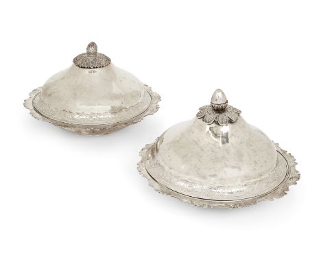 Two Turkish Ottoman Empire silver entrée dishes. Stamped with pre-1923 Tughra mark to bases. Of circular form, the bases desi