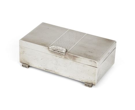 An Art Deco style silver cigarette box. Garrard & Co., Birmingham, 1959. Of rectangular form, the lid designed with linear an