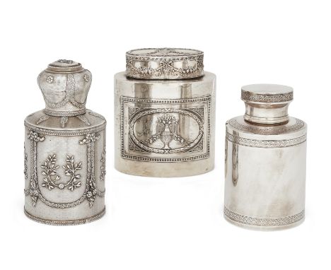 A French silver tea caddy. 950 standard. The engine turned, cylindrical body applied with floral garlands and swags, the pull