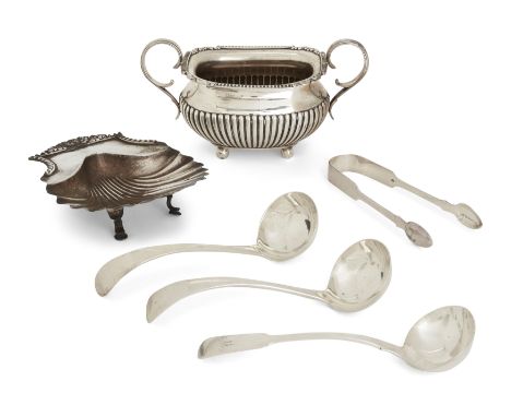 A group of silver including a shell-shaped butter dish. Manoah Rhodes & Sons, London, 1905. Raised on three pad feet, 13.2 x 
