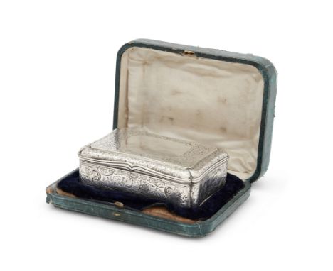 A Victorian silver table snuff box.  Edward Smith, London, 1858. Of shaped, rectangular form, the cover, sides and base chase