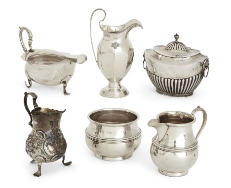 A group of silver including a Victorian tea caddy with mask handles. Goldsmiths & Silversmiths Co., London, 1897. Of oval for