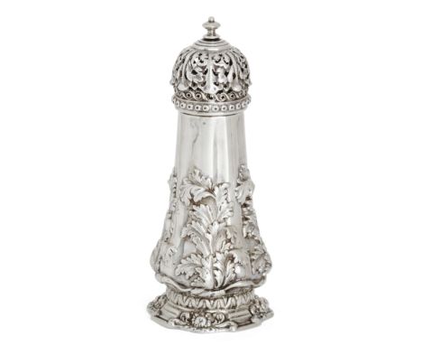 A decorative Victorian silver caster. Henry Wilkinson & Co., Sheffield, 1850. The tapering body richly repousse decorated wit