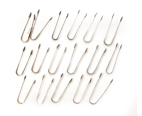 A group of Georgian silver sugar tongs. Various dates and makers. The group including: two pairs of George III tongs by Willi