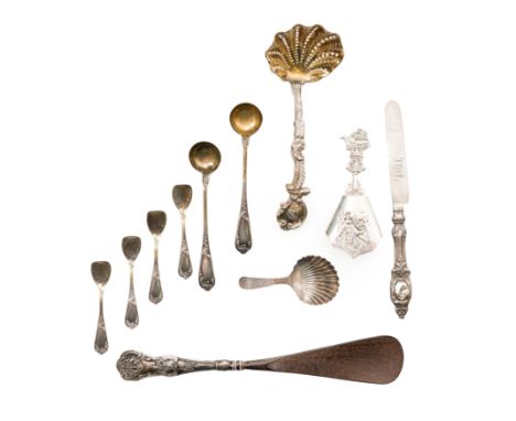 A Victorian parcel gilt silver sifting ladle. Francis Higgins II, London, 1843. The cast spoon designed with a pierced shell 
