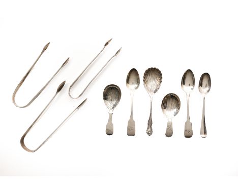 A group of silver sugar tongs and spoons. Various dates and makers. The group comprising: a pair of Georgian sugar tongs, Hes