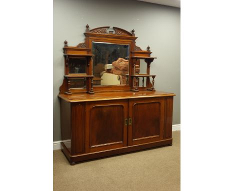Victorian mahogany sideboard with mirrored raised back, the base with two arched panel doors, W165cm, H180cm, D61cm    Condit