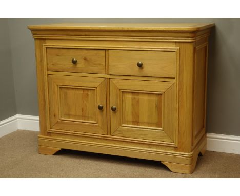Solid light oak sideboard fitted with two drawers and two panel  cupboards, on shape supports, L112cm, H86cm, D48cm   Conditi