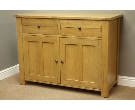 Willis & Gambier Solid light oak sideboard fitted with two drawers above two panel doors, W121cm, H88cm, D49cm   Condition Re