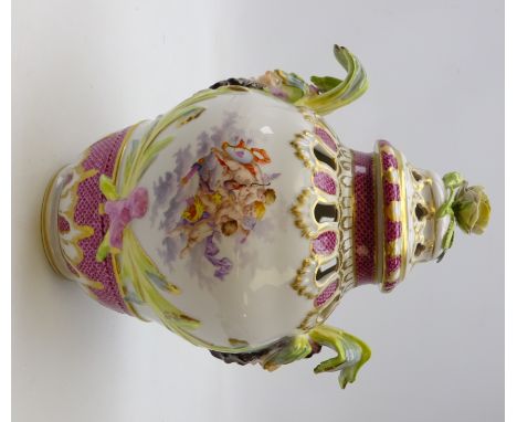 Late 19th/ early 20th century Berlin porcelain pot pourri vase and cover, painted with putti and floral vignettes, two mask a